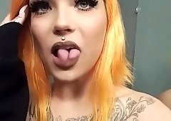 Tattooed woman blowjob penis slowly